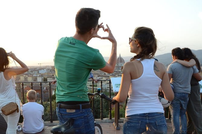 Electric Bike Night Tour of Florence with amazing view from Michelangelo Square - Entering Florence by e-bike at 8:00pm