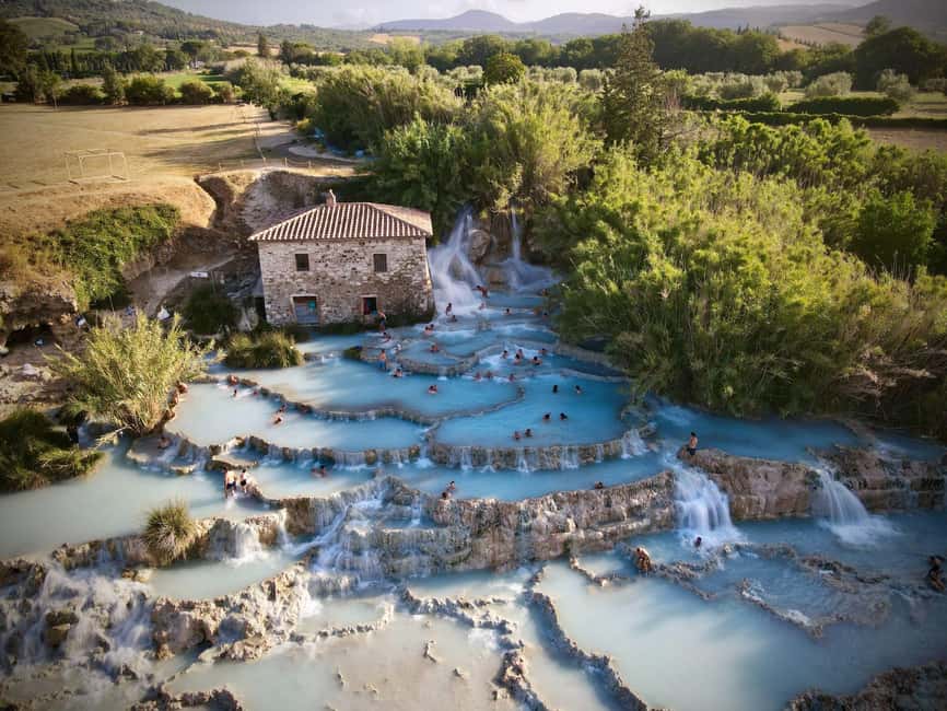 Florence: Day Trip to the Saturnia Thermal Baths - First look at Saturnia: limestone pools and that waterfall effect