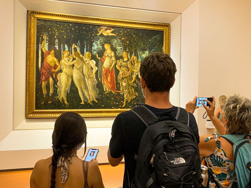 Florence: Fast-track Uffizi Gallery Hosted Tickets - Where to meet the host: Giotto statue, ItalyPass Tours sign