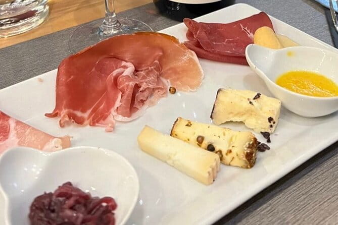 Florence Food Tour with Truffle Pasta, Steak & Free Flowing Wine - Stop 1: Prosciutto, cheese wine, and 30-year balsamic vinegar