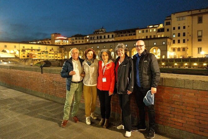 Florence Night Bike Tour with Wine and Aperitivo Picnic included - Crossing through Santa Maria Sopr’Arno and toward Ponte Vecchio