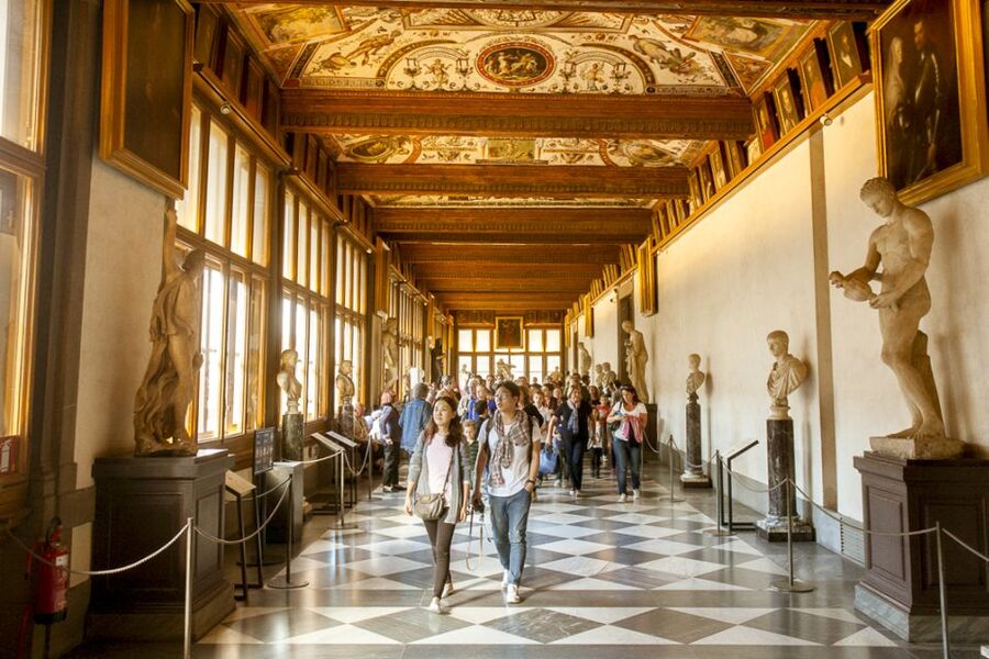Florence: Walking Tour and Accademia Gallery Tour - Piazza della Repubblica: arcades, cafés, and the feel of city life