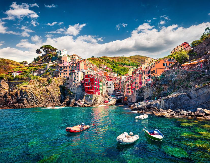 From Florence: Cinque Terre & Pisa Leaning Tower Day Tour - Manarola: calmer streets and grapevines in the background