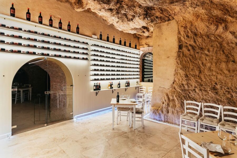 From Florence: Val D'Orcia Tour with Wine Tasting - Montepulciano: Vino Nobile cellars, steep streets, and New Moon filming trivia