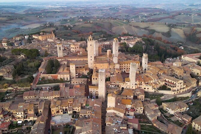 Private Excursion to Siena, San Gimignano and Chianti Landscapes - Siena, Piazza del Campo, and the Palio square you can feel in your feet