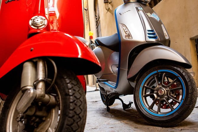 Rent your Electric Vespa 45 in Florence for 8 hours - Borgo Ognissanti check-in: helmets, phone setup, and riding coaching