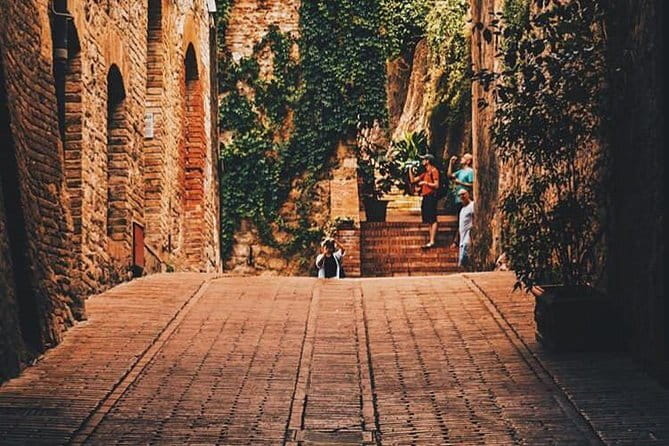 San Gimignano and Volterra Tour by Private Luxury Van - San Gimignano’s UNESCO historic center and the tower skyline